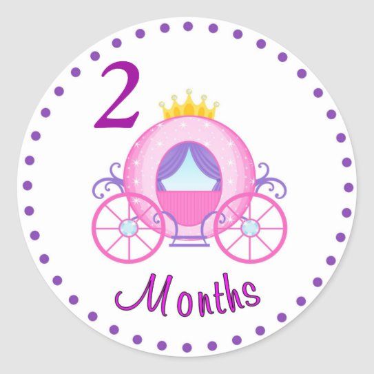 a round sticker with a pink and purple princess carriage on it's side