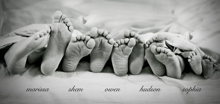 four feet are arranged in the middle of a row on top of each other with words written below them