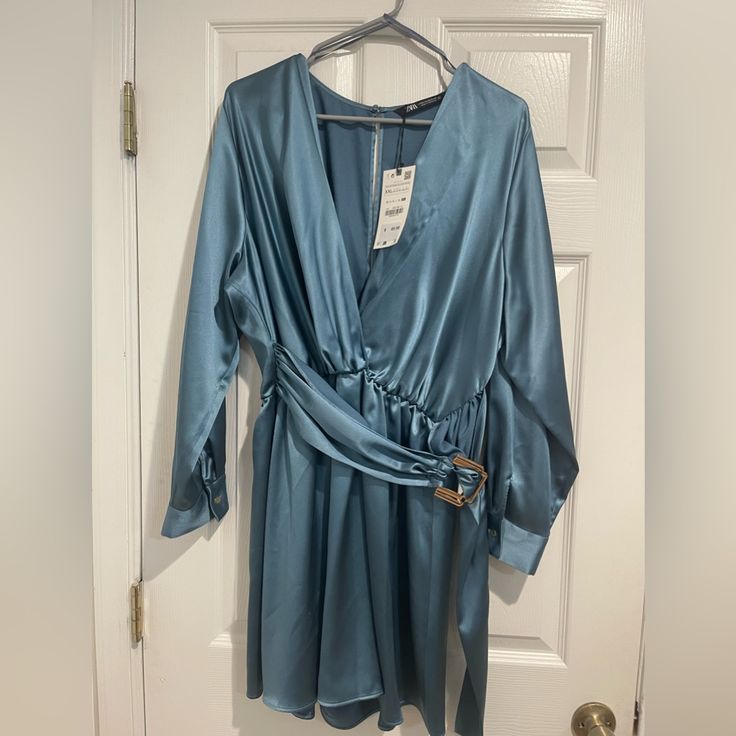 Never Worn With Tags Blue Satin Romper With Belt Chic Blue Belted Jumpsuits And Rompers, Elegant Long Sleeve Jumpsuits And Rompers By Zara, Blue Jumpsuits And Rompers For Night Out In Fall, Zara Long Sleeve Jumpsuits And Rompers For Party, Blue Long Sleeve Jumpsuits And Rompers For Night Out, Zara Long Sleeve Jumpsuit For Party, Zara Long Sleeve Party Jumpsuits And Rompers, Elegant Blue Zara Jumpsuits And Rompers, Blue Long Sleeve Jumpsuit For Night Out