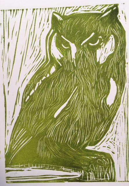 a green and white drawing of an owl