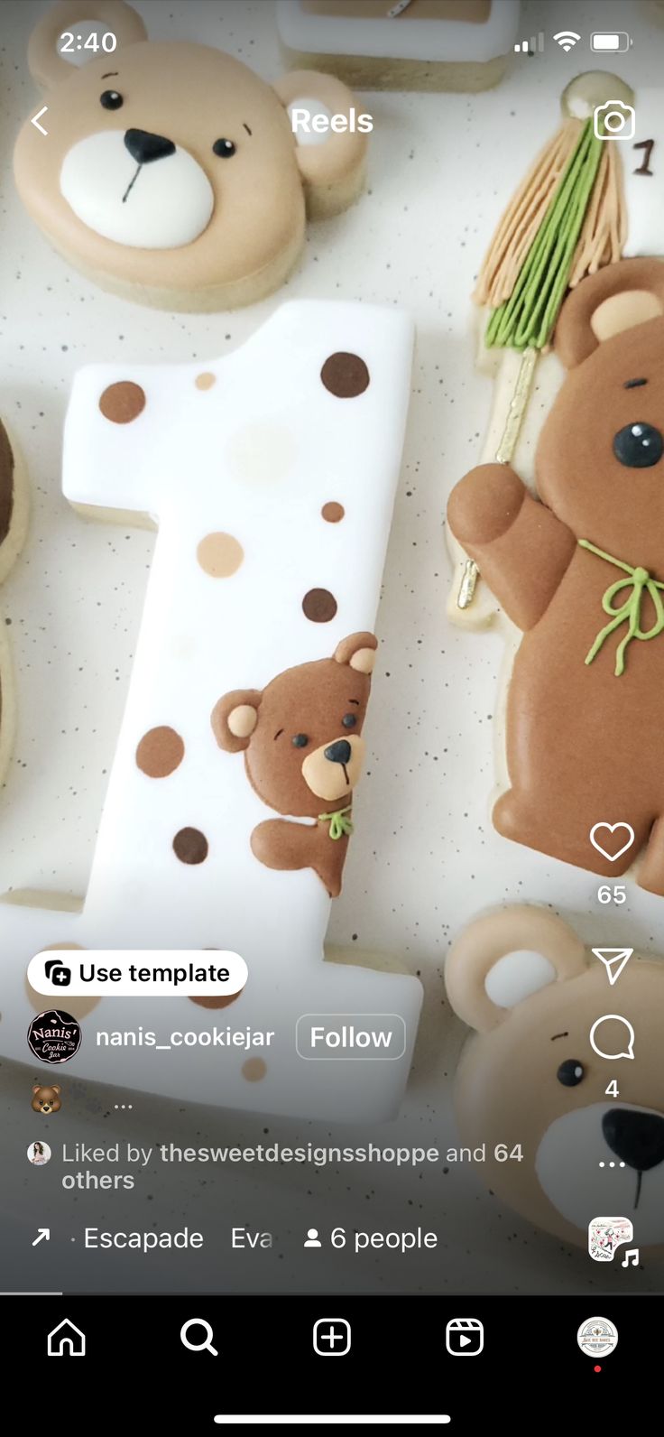 the number one is made out of fondant and decorated with teddy bears as decorations