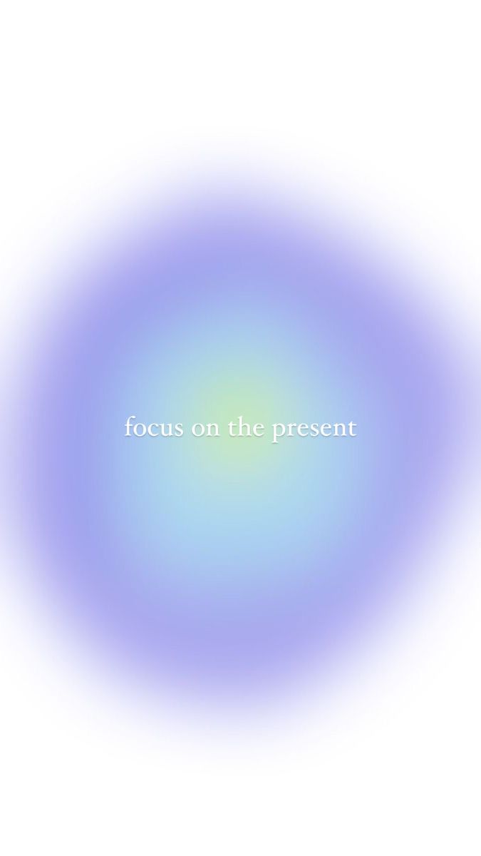 the words focus on the present in white and blue