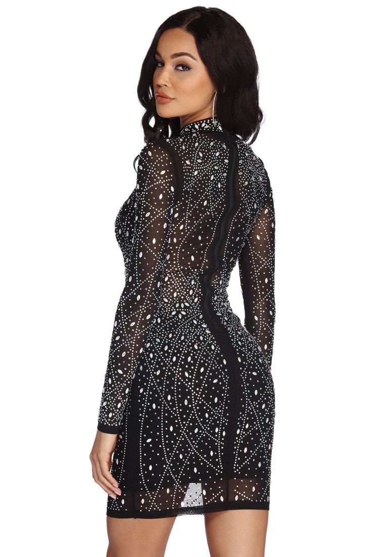 Special OccasionGlow on like the star you are in our show stoppingLorelei black dress! She features a mock neck. unlined long sleeves and a party ready mini lengthsilhouette. Lorelei is composed of a sheer mesh fabric adorned with sparkling heat stones and gemstones for dazzling shine! Lorelei offers a form hugging fit with a moderate stretch. Dress includes a partial skirt lining and back zipper closure. Undergarments not included.Model is 5'8.5" with a 32" bust. 24" waist and 35" hips. She is wearing a size small.Special Occasion products cannot be returned to any retail locations. Glamorous Long Sleeve Mini Dress For Date Night, High Neck Long Sleeve Evening Dress For Fall, Elegant Long Sleeve High Neck Dress For Party, Chic High Neck Long Sleeve Dress For Night Out, Chic Long Sleeve High Neck Dress For Night Out, Black High Neck Bodycon Party Dress, Black High Neck Bodycon Dress For Party, High Neck Long Sleeve Dress For Fall Party, Fall Party High Neck Long Sleeve Dress