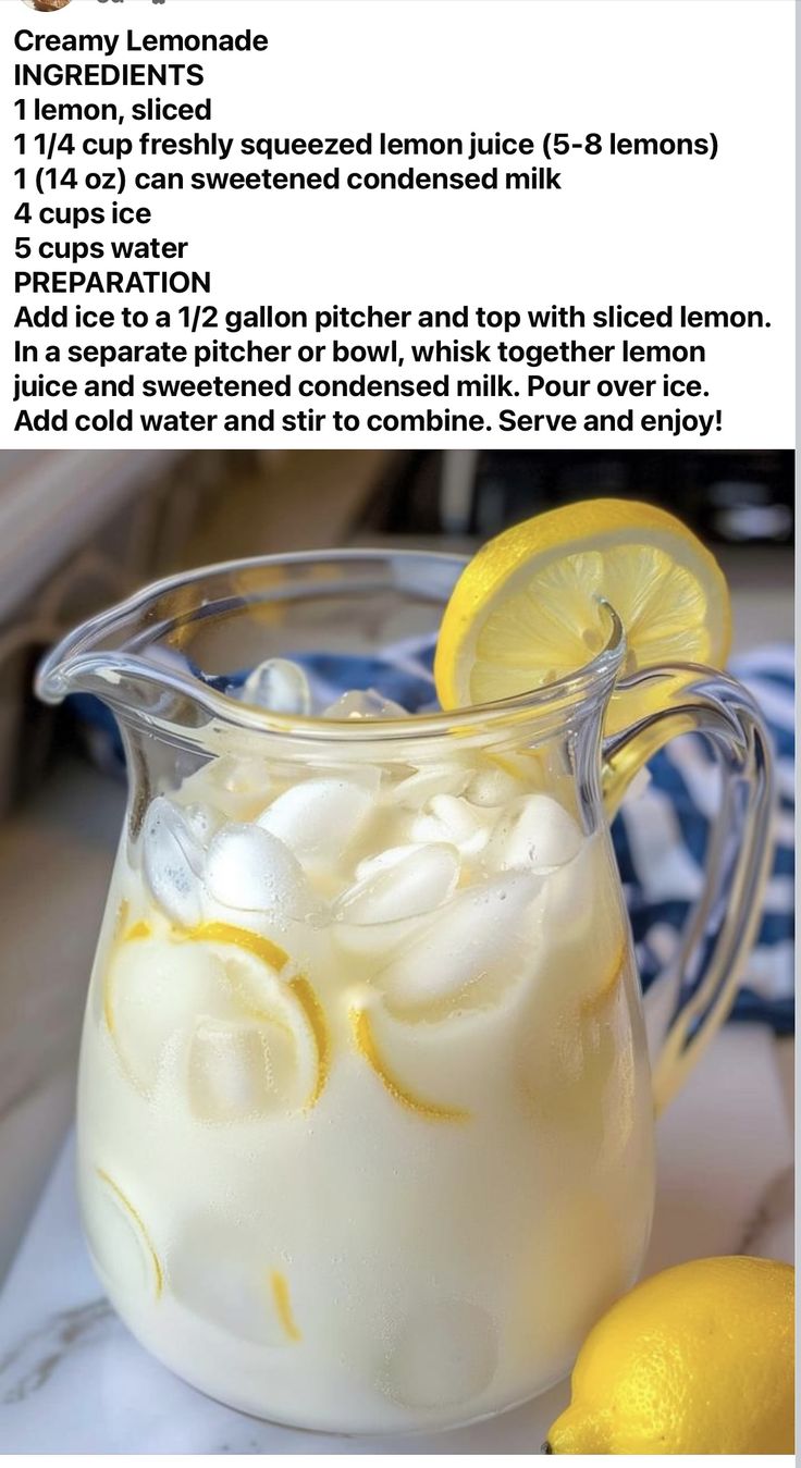 a pitcher filled with ice and lemons on top of a table