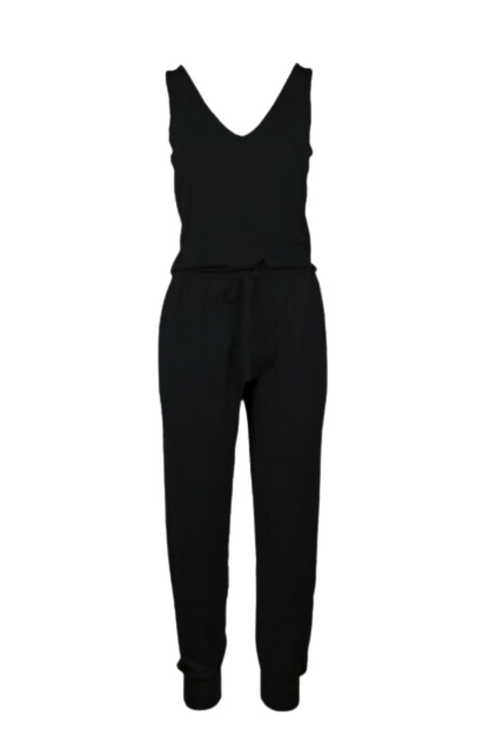 The best part about a jumpsuit is that you have an entire outfit in one piece. It feels like a sweatsuit but looks stylish and polished. The drawstring waist is adjustable and made to flatter. We’ve paired this piece with sneakers and a jean jacket for a stylish weekend ensemble. It also looks great with the Peg hoodie for a sportier look. The jumpsuit paired with a long-sleeved shirt layered underneath is another great look. Sporty Loungewear Jumpsuits And Rompers For Fall, Sporty Fall Loungewear Jumpsuits And Rompers, Relaxed Fit Jumpsuits And Rompers For Athleisure, Relaxed Fit Athleisure Jumpsuits And Rompers, Black Lounging Jumpsuits And Rompers For Spring, Casual Jumpsuits And Rompers With Drawstring For Loungewear, Casual Jumpsuits And Rompers With Tie Waist For Fall, Casual Drawstring Jumpsuits And Rompers For Loungewear, Casual Jumpsuits And Rompers With Tie Waist