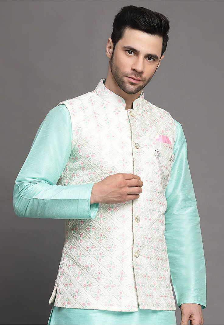 Art Silk Nehru Jacket in Off White This Readymade Sleeveless attire is Enhanced with Buttons and Resham Work. Crafted in Chinese Collar Neck Do note: Brooch and Kurta shown in the image is for presentation purposes only. Half to one inch may vary in measurement. (Slight variation in actual color vs. image is possible) Spring Wedding Nehru Jacket With Traditional Drape, Spring Wedding Bandhgala With Traditional Drape, Embroidered Nehru Jacket For Reception And Festivals, Festival Embroidered Nehru Jacket For Reception, Embroidered Nehru Jacket For Festivals And Receptions, White Sleeveless Kurta With Zari Work, White Sleeveless Nehru Jacket With Resham Embroidery, Transitional Nehru Jacket With Pallu For Reception, Sleeveless Nehru Jacket With Resham Embroidery For Wedding