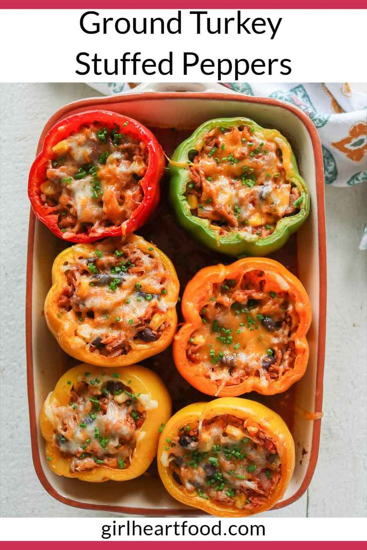 an image of stuffed peppers in a casserole dish with text overlay that reads ground turkey stuffed peppers