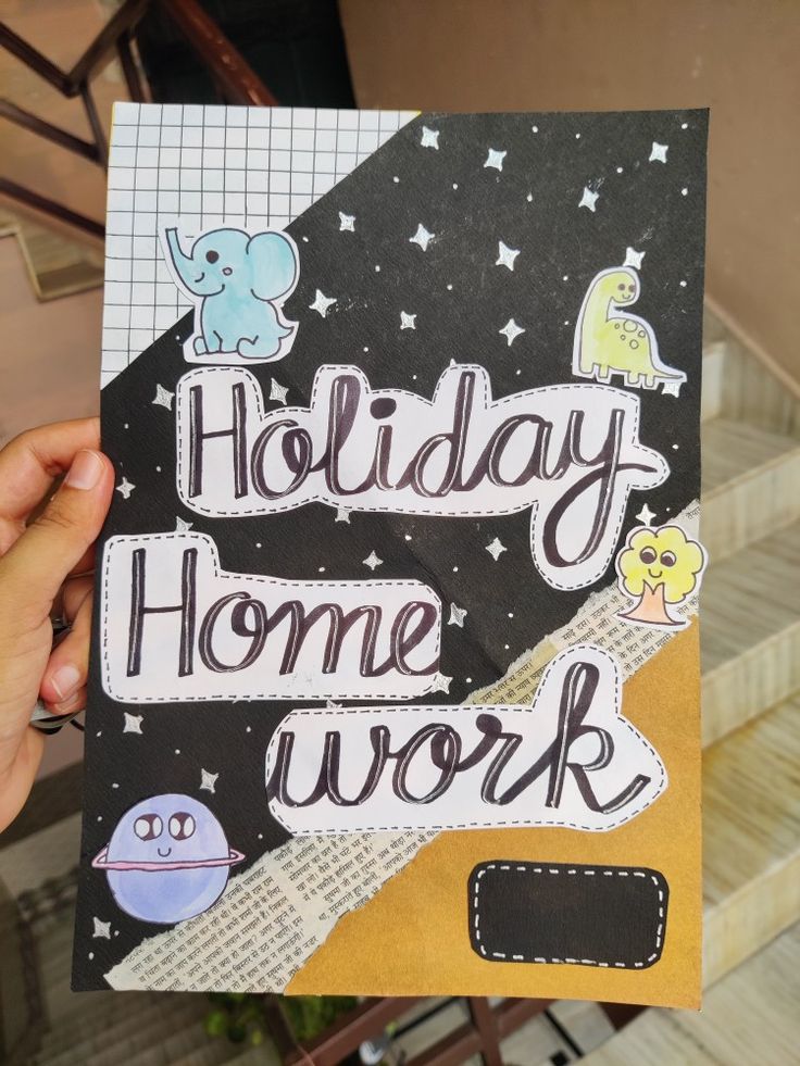 a hand holding up a card with the words holiday home work on it and an elephant