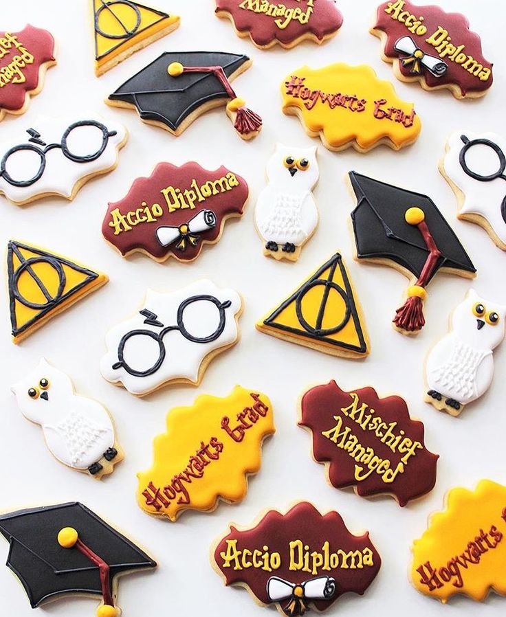 harry potter themed cookies are arranged on a table