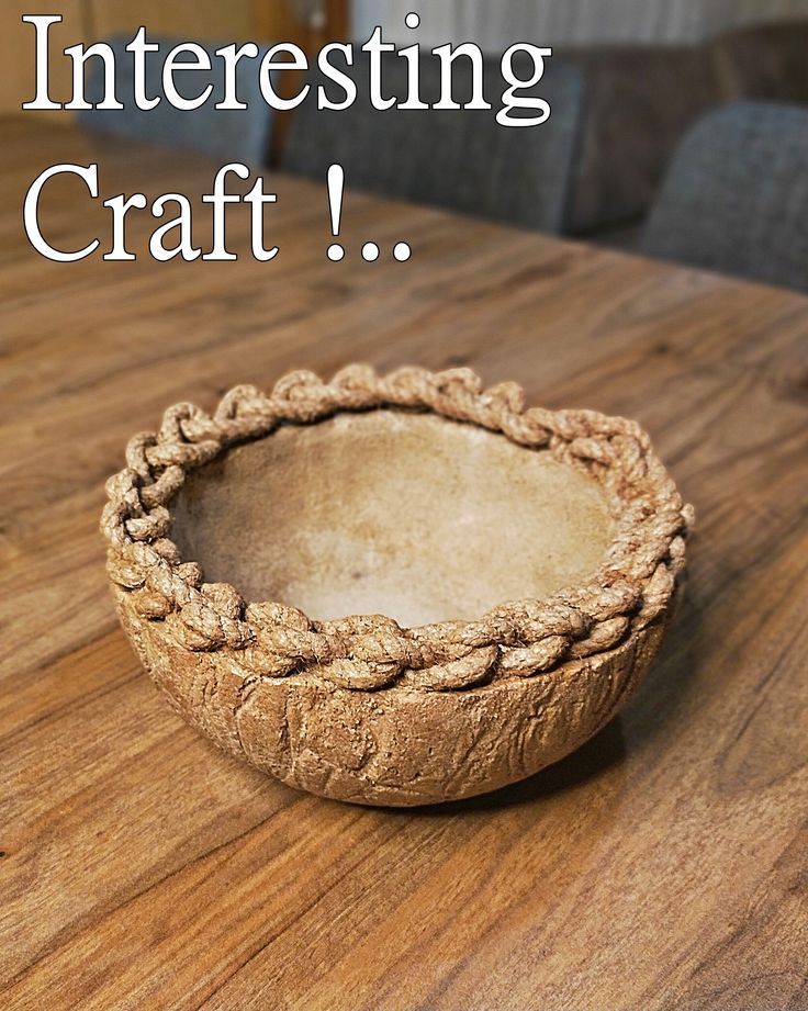 a wooden bowl sitting on top of a table with the words interesting craft above it