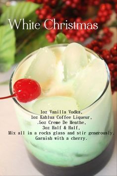 a white christmas drink in a glass with a cherry on the rim and text below it