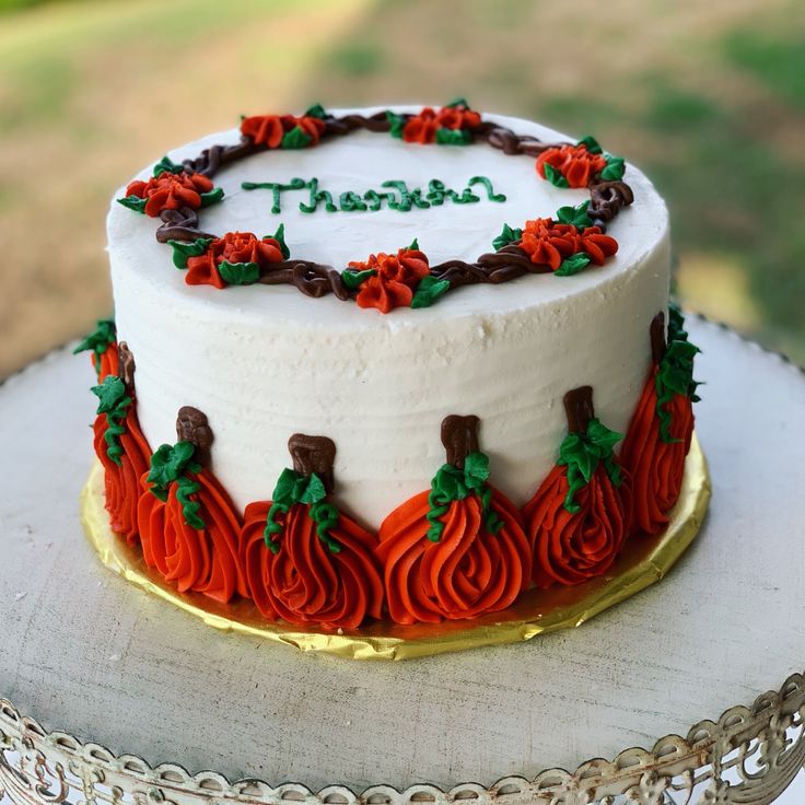 a white cake decorated with red and green frosting