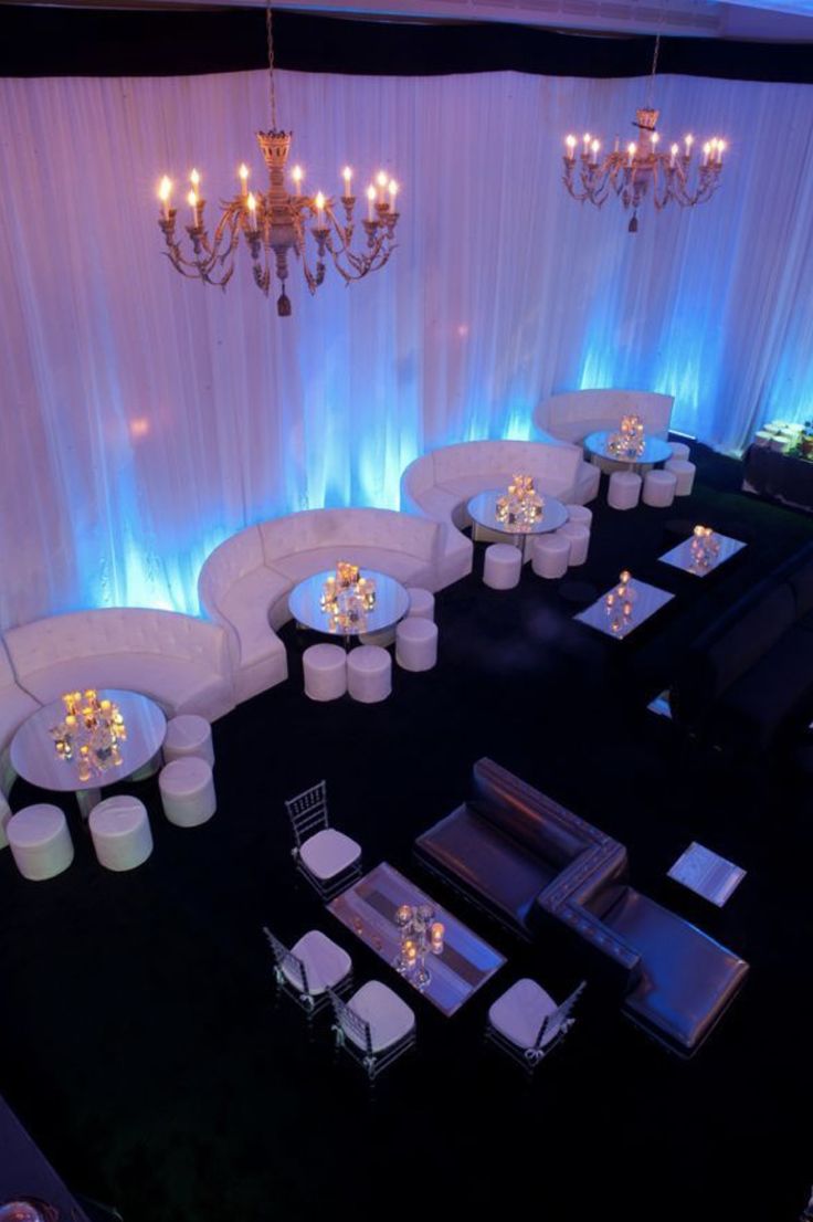 an overhead view of a banquet room with white tables and chairs