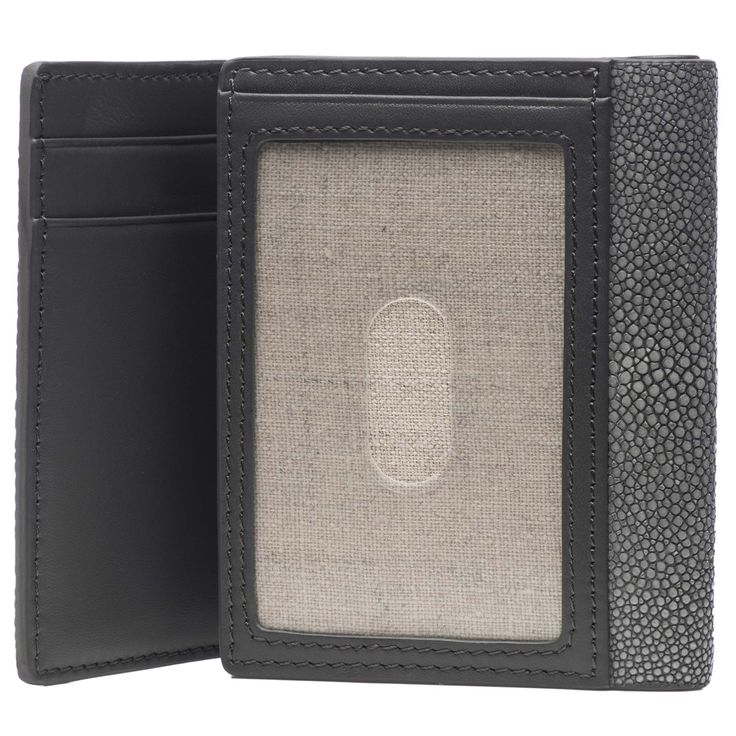 Feast your eyes on Evan. This slick men’s tri-fold is crafted with genuine leather throughout. The outside is a beautiful showcase of genuine shagreen and the interior is trimmed with smooth Napa leather. The wallet’s inside is home to pockets that are perfect for holding credit cards and more, with a traditional wider pocket for holding bills. Evan has a photo ID window on the inside as well that is kissed with linen lining and is finished with a plastic overlay protector. This handsome wallet, Formal Trifold Wallet With Id Window, Formal Leather Card Holder With Id Window, Leather Card Holder With Id Window For Formal Use, Designer Leather Trifold Wallet With Card Slots, Business Leather Trifold Wallet With Id Window, Designer Trifold Wallet For Formal Occasions, Leather Trifold Wallet With Id Window, Luxury Trifold Wallet For Business, Modern Leather Trifold Wallet With Id Window