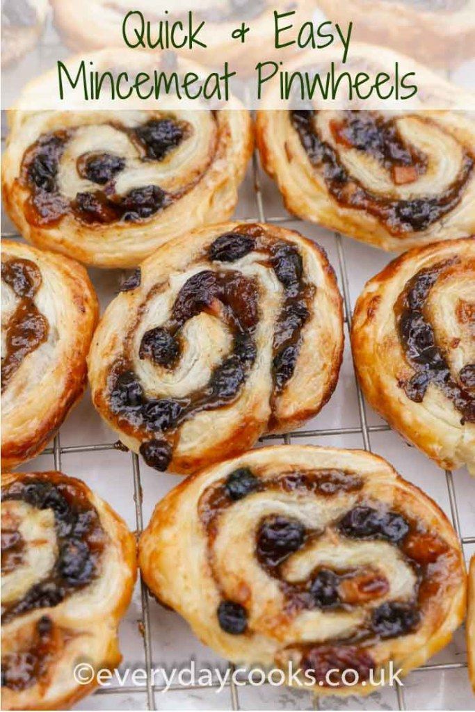 mini cinnamon rolls with raisins on top and text overlay reading quick & easy homemade pinwheels