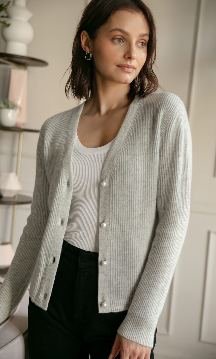 A timeless, versatile classic that layers beautifully with just about any outfit for an effortlessly chic look. Knit with supremely warm and lightweight cashmere, you won't want to leave home without it. V-neck cardigan with elegant ribbed knit. White pearlescent buttons. Hits at the hips. Wear open or buttoned up. FIT: Relaxed fit. Size down if you're between sizes. 100% LUXURY CASHMERE Sweaters And Cardigans, Everyday Luxury, Cashmere Wrap, Cashmere Turtleneck, Wrap Cardigan, V Neck Cardigan, Cashmere Cardigan, Cashmere Coat, Cute Woman