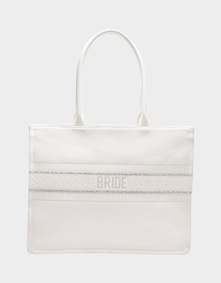 BRIDE TOTE WHITE White Canvas Bag With Dust Bag, Wedding Gift Bag Tote, Chic White Wedding Bag, Chic White Wedding Bags, White Rectangular Bags For Bridesmaid Gift, Wedding Gift Tote Bag, White Wedding Gift Bag, Bridal Essentials, Bachelorette Tote