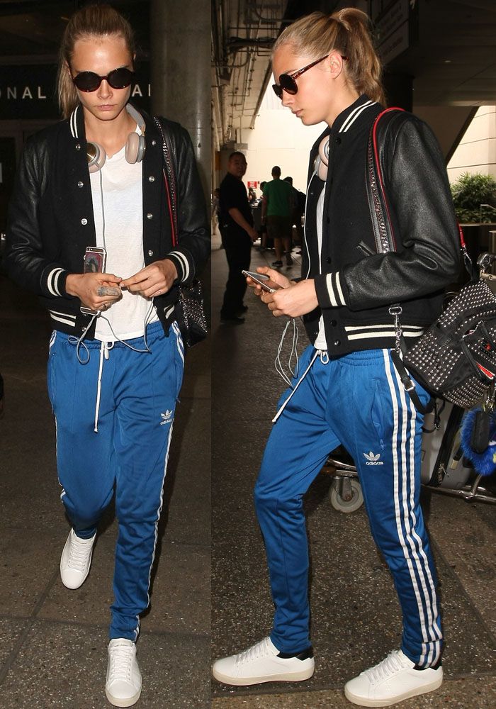 Adidas Style Women, Adidas Track Pants Outfit Woman, Adidas Track Pants Outfit, Adidas Street Style, Adidas Pants Outfit, Cara Delevingne Style, Looks Adidas, Saint Laurent Sneakers, Track Pants Outfit