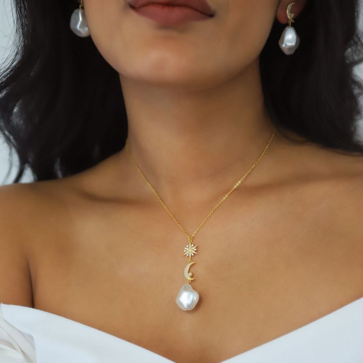 Bronte is a gorgeous mix of timeless classic meets celestial style. She features a pave crystal adorned north star & crescent moon each with a small pearl stone dropped from a gold vermeil chain. Hanging underneath the celestial charms is a large pearl adding a beautiful finishing touch. Bronte would be a perfect choice for lapping up the Summer Sun on a beach somewhere or for a wedding she really is very versatile and if you're looking for something to make a stunning statement then she really Wedding Fine Jewelry Necklace With Moon Charm, Elegant Crescent Necklace For Wedding, Elegant Crescent Wedding Necklace, Fine Jewelry With Moon Charm For Wedding, Elegant Formal Jewelry With Moon Charm, Elegant Moon Charm Necklace For Wedding, Luxury Moon-shaped Wedding Jewelry, Delicate Moon Charm Necklace For Wedding, Delicate Wedding Necklaces With Moon Charm