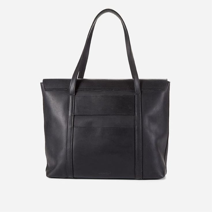 The Awassa Tote is the ultimate travel companion, crafted from premium full-grain leather that exudes quality and durability. This carry-on tote seamlessly suits any style, any gender, and any form of travel. Its spacious design includes an under-flap zipper, accommodating a 15-inch laptop and all your essentials for both quick getaways and long international flights. Inspired by our treks to Ethiopia, the Awassa Tote features a discreet trolley sleeve and phone pocket on the back, perfect for s Leather-lined Tote Travel Bag For Business Trips, Classic Tote Laptop Bag For Travel, Classic Travel Tote Laptop Bag, Classic Travel Laptop Tote Bag, Business Travel Tote Bag With Leather Lining, Leather Weekender Bag For On-the-go, Timeless Travel Briefcase In Tote Style, Timeless Travel Tote Briefcase, Classic Tote Travel Bag For Business Trips