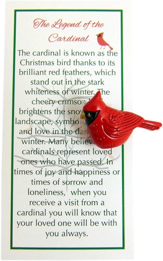 a red cardinal ornament on a card with the words cardinal and poem below it