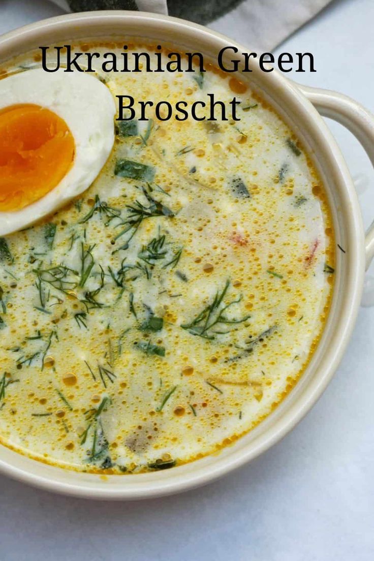 a bowl of soup with an egg on top and the words ukraine green broccoli