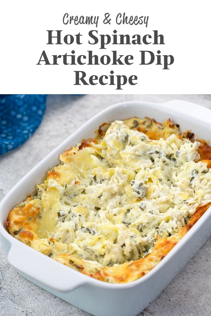 creamy and cheesy hot spinach artichoke dip recipe in a white casserole dish