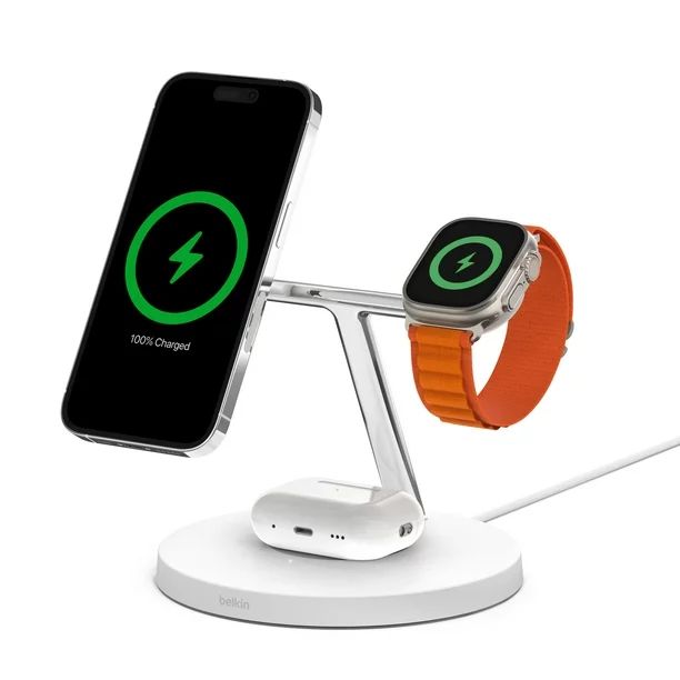 an apple watch and charger stand on top of each other with the charging dock attached to it