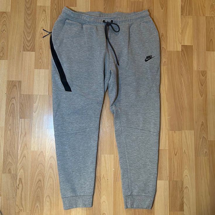 Brand New Without Tags! My Brother Bought These Online But Theyre Too Small On Him So He Never Got To Wear Them. Retailed: $110. Tapered Style. Also Have These Listed In L Nike Gray Fleece Activewear, Nike Gray Cotton Joggers, Nike Gray Fleece Bottoms, Gray Fleece Activewear With Pockets, Casual Gray Nike Joggers, Nike Gray Sweatpants For Streetwear, Nike Gray Sportswear Sweatpants, Nike Tech Fleece Grey, Pants Nike