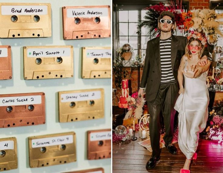 a man and woman standing next to each other in front of a wall with cassettes on it