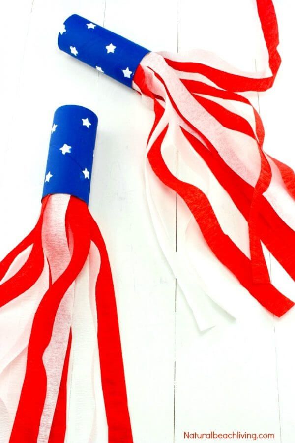 two red, white and blue streamers with stars on them sitting next to each other