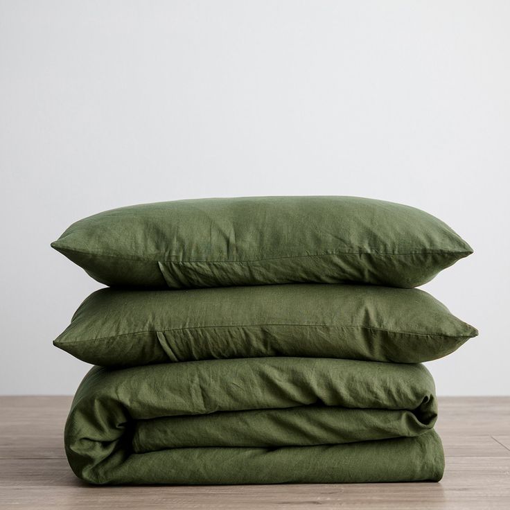 three pillows stacked on top of each other