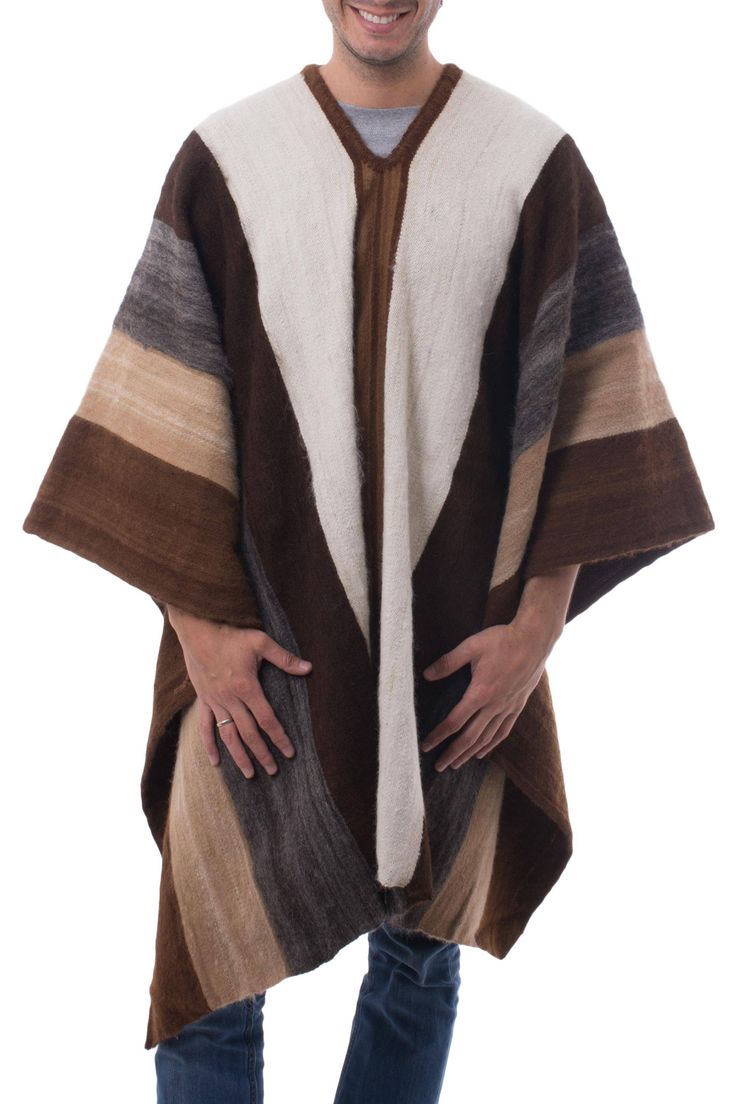 Warm shades of brown, grey and ivory evoke Andean fields in Autumn. Working in luxurious alpaca, Faustino Maldonado creates a men's poncho with wide bands of earthen colors. The warm but lightweight garment is woven by hand on a traditional loom. Mexican Traditional Clothing, Mens Poncho, Stylish Spring Outfit, Alpaca Poncho, Blue Jordans, Wool Poncho, Country Dresses, Poncho Pattern, Cat Woman Costume