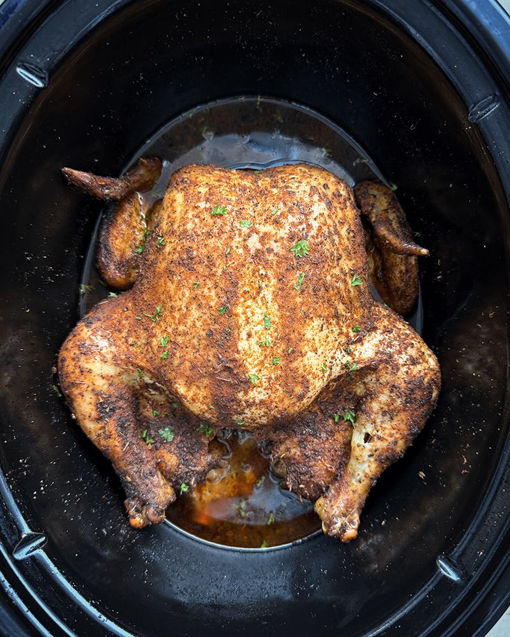 a cooked chicken in an air fryer