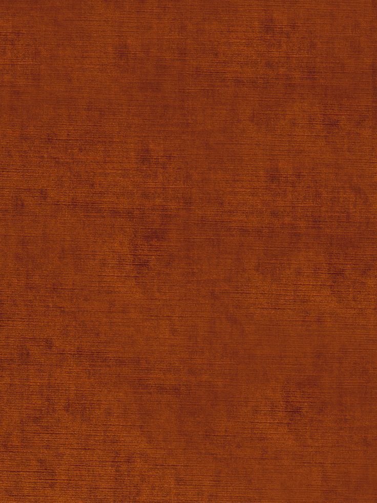 an orange fabric textured with some sort of stain on the outside, and it looks like wood grain