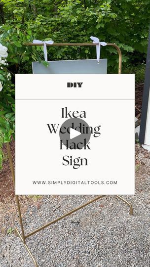 a sign that is sitting in front of some trees and bushes with the words ikea wedding hack sign on it