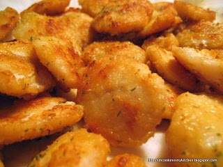 some fried food is on a white plate