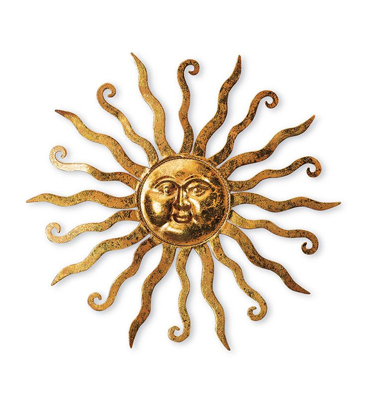 a gold sun with two faces on it