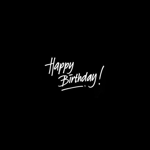 a black background with the words happy birthday written in white ink on it's left side