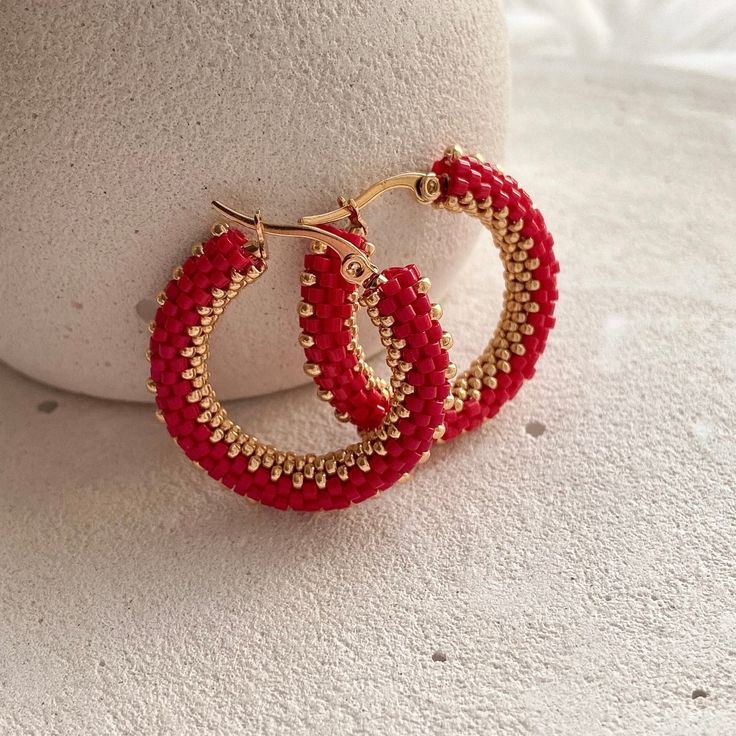 💖 Add a pop of color to your outfit with these red & gold seed bead hoop earrings! These beaded hoop earrings are perfect for adding a touch of fun to any look, whether you're dressing up for Halloween or looking for a unique Christmas gift for your best friend. Stand out from the crowd and show off your unique style with these eye-catching earrings! These handmade hoop earrings are not only stylish but also comfortable to wear all day long * MATERIALS * Hoops are made of high quality Japanese Adjustable Hoop Earrings With Gold Beads As Gift, Adjustable Gold Beads Hoop Earrings As Gift, Trendy Colorful Beaded Hoop Earrings For Gifts, Trendy Hoop Jewelry For Jewelry Making, Adjustable Gold Beaded Hoop Earrings As Gift, Everyday Red Jewelry With Colorful Beads, Handmade Hoop Earrings For Festive Occasions, Trendy Handmade Hoop Beaded Earrings, Small Hoop Red Earrings For Everyday