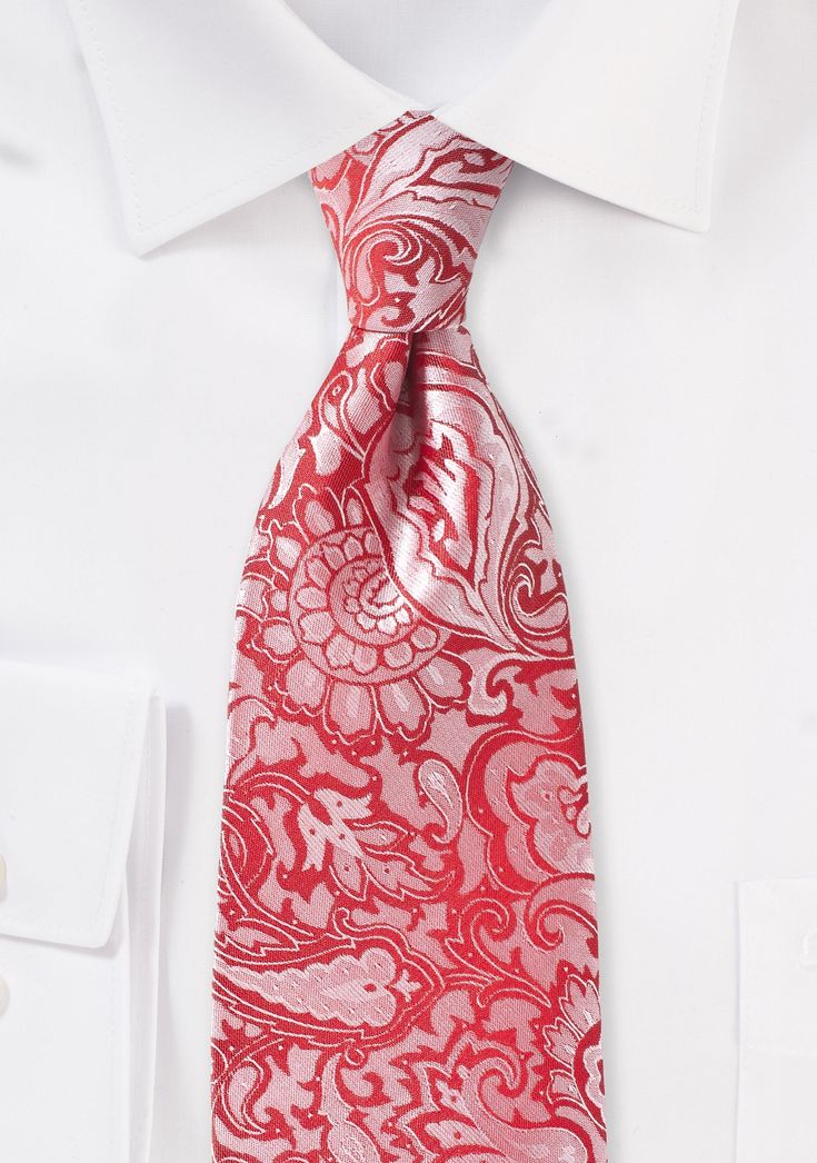 Enhance your formal ensemble with the captivating charm of our Vivid Poppy Floral Paisley Necktie. Crafted with meticulous attention to detail, this exquisite accessory boasts an explosion of vibrant hues, blending the elegance of paisley motifs with the whimsy of blooming poppy flowers. The interplay of bold reds, delicate pinks, and lush greens creates an eye-catching symphony that demands attention. Perfect for any dapper occasion, whether it's a black-tie affair or a stylish soiree, this nec Elegant Paisley Print Tie As A Gift, Elegant Paisley Print Ties As Gift, Elegant Paisley Print Suit And Tie Accessories For Gift, Elegant Semi-formal Ties With Paisley Print, Elegant Semi-formal Paisley Print Ties, Elegant Formal Ties With Paisley Print, Elegant Wedding Ties With Paisley Print, Elegant Red Suit And Tie Accessories For Gift, Elegant Black Tie Suit Accessories With Paisley Print