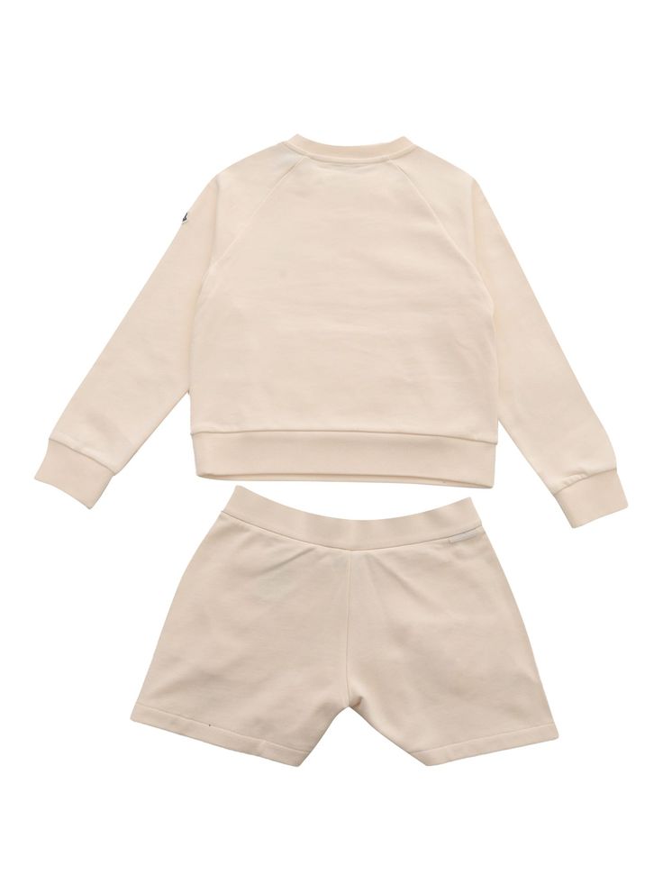 Unisex Moncler beige 2-piece sports suit with sweatshirt and shorts, tone-on-tone stitched logo.Composition: 100% COTTON FABRIC 2 100% COTTON INTERIOR 100% COTTON FABRIC 4 100% COTTON Sporty Solid Cotton Sets, Sporty Cotton Sets With Ribbed Cuffs, Sweatshirt And Shorts, Logo Composition, Kurt Geiger Heels, Luxury Sportswear, Versace Sweatshirt, Barbour Steve Mcqueen, Self Portrait Dress