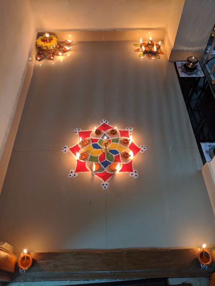 an overhead view of a decorated floor with candles