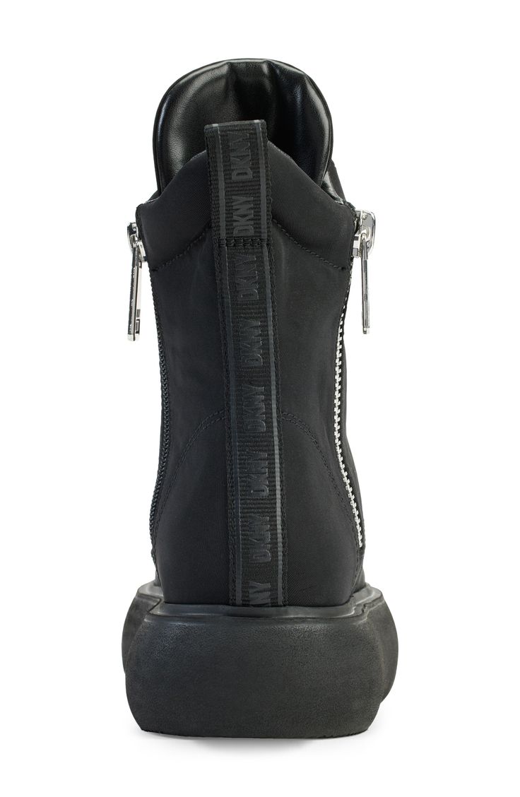 A durable sneaker-boot gives off moto vibes with gleaming zippers racing up the sides and a chunky rubber platform sole. 1 3/4" platform Textile and rubber upper/textile lining/rubber sole Imported Golf Bags, Rubber Sole, Sneaker Boots, Womens Boots, Size 7, Nordstrom, Backpacks, Zipper, Boots