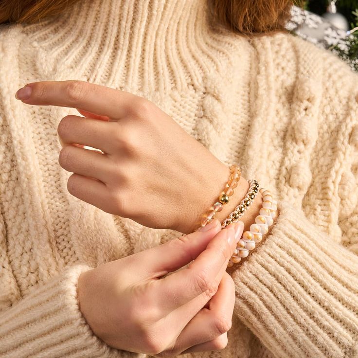 Finish: Gold Cord Color: White Cord Style: Adjustable Nylon Base: Stainless Steel The Catena Links Bracelets are hand-crafted with gold finished links and are hand-strung on an adjustable woven nylon cord. Each Catena Links bracelet includes a matching gold finished NOGU logo plate. With their adjustable nylon cord, these bracelets are one size fits all. Trendy Gold Beaded Braided Bracelets, Casual Gold Beaded Bracelets For Party, Gold Friendship Bracelets With Gold Beads, Casual Gold Resizable Braided Bracelets, Friendship Bracelet With Gold Beads, Casual Gold Friendship Bracelets With Gold Beads, Casual Gold Resizable Beaded Bracelets, Gold Braided Bracelets For Friendship, Casual Gold Beaded Friendship Bracelets