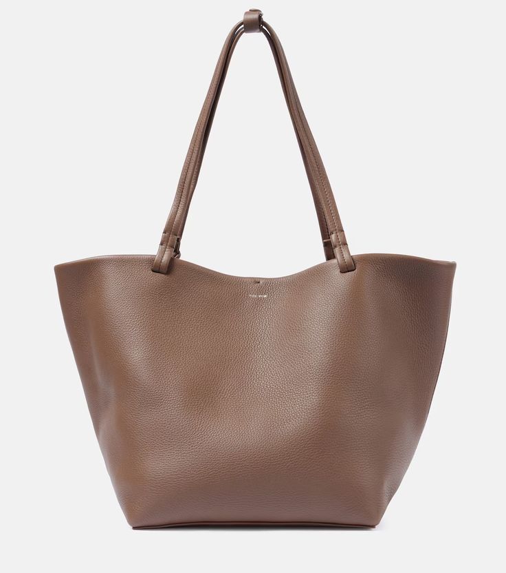 Park Three leather tote bag in brown - The Row | Mytheresa Timeless Textured Leather Tote Shoulder Bag, Business Tote Shoulder Bag With Smooth Grain Leather, Business Tote Shoulder Bag With Smooth Grain, Leather Double Handle Bucket Bag For Business, Timeless Smooth Grain Shoulder Bag For Shopping, Timeless Bucket Bag With Leather Lining, Soft Leather Bucket Bag Tote, Classic Leather Bucket Bag With Double Handle, Timeless Soft Leather Bucket Bag For Daily Use