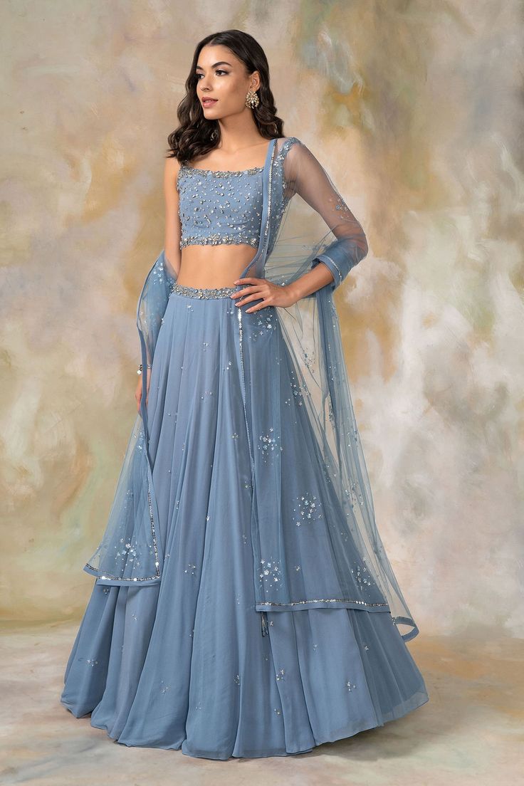 Blue, Grey lehenga with embellished detail. Comes with embellished blouse and dupatta.
Components: 3
Fabric: Georgette, Net
Neckline: Square
Sleeve Length: Sleeveless
Color: Blue, Grey
Embellished
Cutdana, sequins work
Sheer dupatta - Aza Fashions Pooja Peshoria, Embellished Lehenga, Grey Lehenga, Sheer Dupatta, Lehenga Design, Simple Lehenga, Trendy Outfits Indian, Indian Outfits Lehenga, Wedding Lehenga Designs