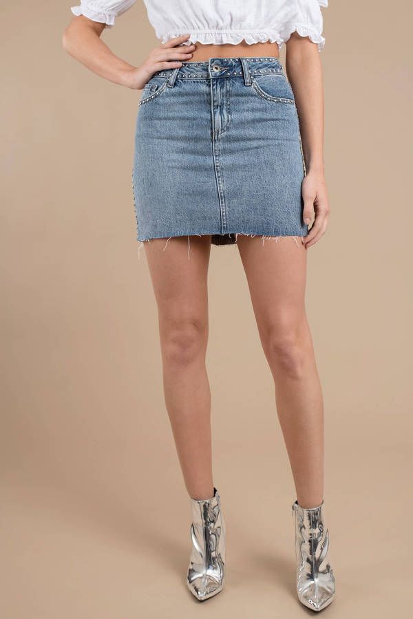 Studded Denim Skirt Edgy Denim Mini Bottoms, Edgy Denim Mini Length Bottoms, Edgy Mini Length Denim Bottoms, Edgy Mini Denim Skirt, Edgy Mini Length Denim Skirt, Edgy High Rise Denim Mini Skirt, Edgy Mid-rise Denim Mini Skirt, Trendy Mid-rise Skirt With Frayed Hem, Edgy Cotton Cutoff Mini Skirt