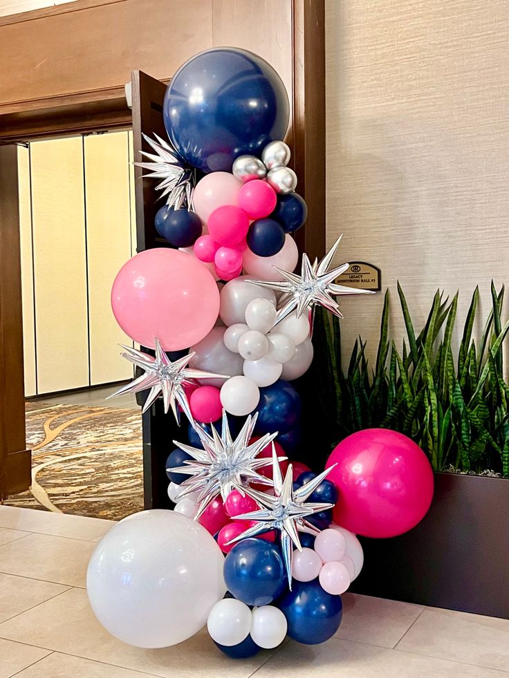 the balloon column is decorated with stars and snowflakes