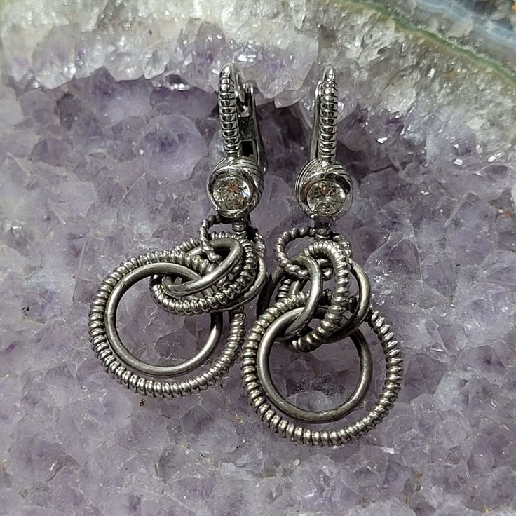 Pre-Own Judith Ripka 925 Earrings. Color: Silver. Size: 1.75"In Of Length Aprox. Dangle Circles Style. Judith Ripka , 925, Thailand Cz Stamped Or Marked. Good Condition. Aproximate Measurements As Flat Lay. Accepting Reasonables Offers 1208-1 Sterling Silver Clip-on Earrings For Anniversary, Elegant Round Hoop Earrings With Oxidized Finish, Elegant Silver Hoop Earrings With Oxidized Finish, Sterling Silver Fine Jewelry Clip-on Earrings For Gift, Sterling Silver Earrings With Silver Clasp, Sterling Silver Oxidized Earrings For Anniversary, Sterling Silver Drop Clip-on Earrings For Anniversary, Sterling Silver Clip-on Earrings Gift, Silver Clip-on Earrings As Fine Jewelry Gift